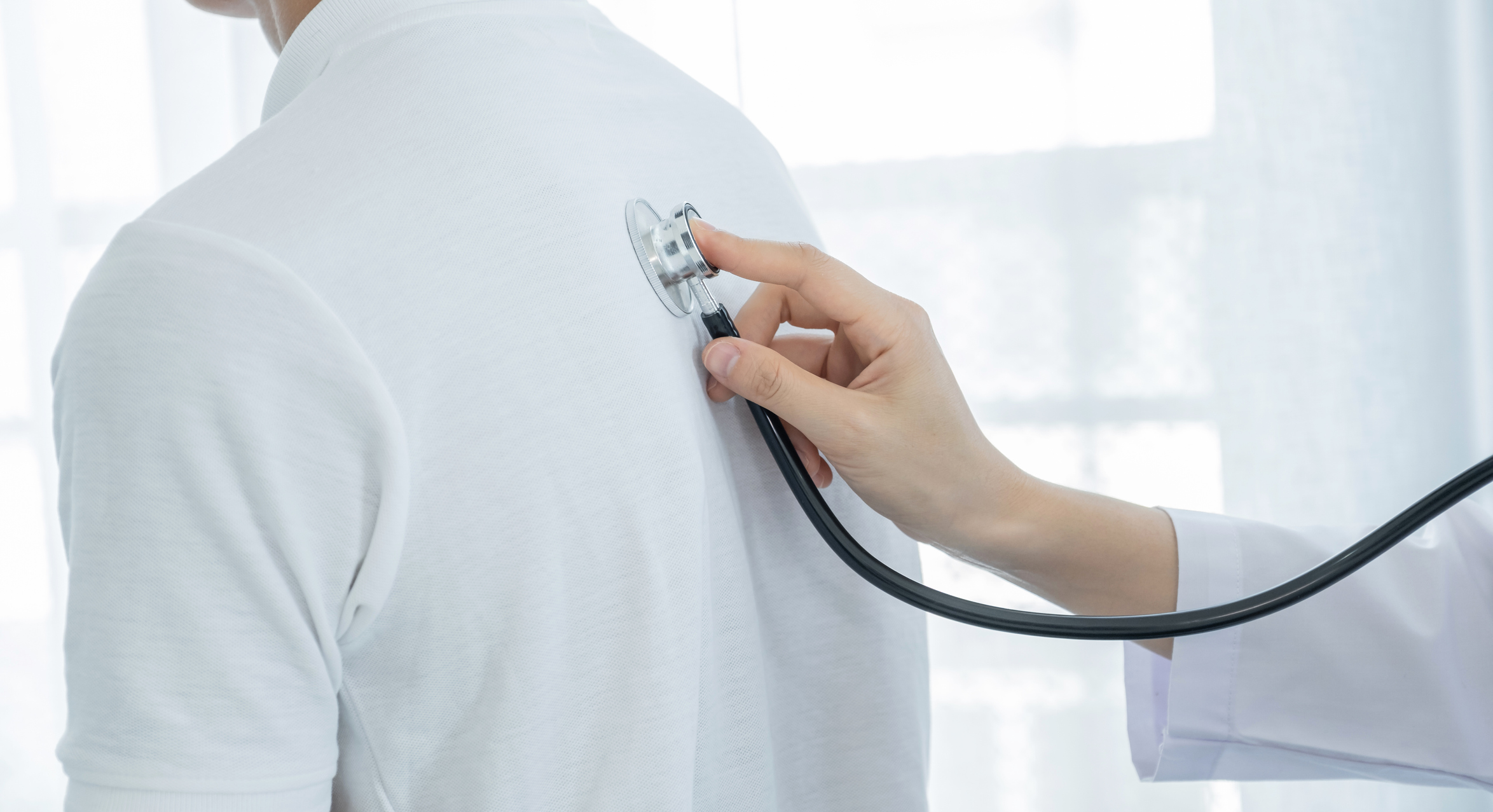 Physician examining a patient at AAIRS Clinic